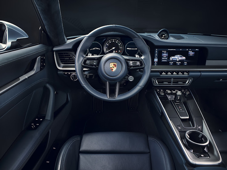 A new interior with more digitisation and a larger touchscreen, but the traditional analogue rev counter still takes centre stage in the instrument panel. Picture: SUPPLIED