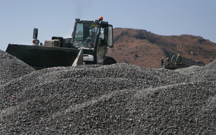 Heaps of platinum ore ahead of the concentration process.