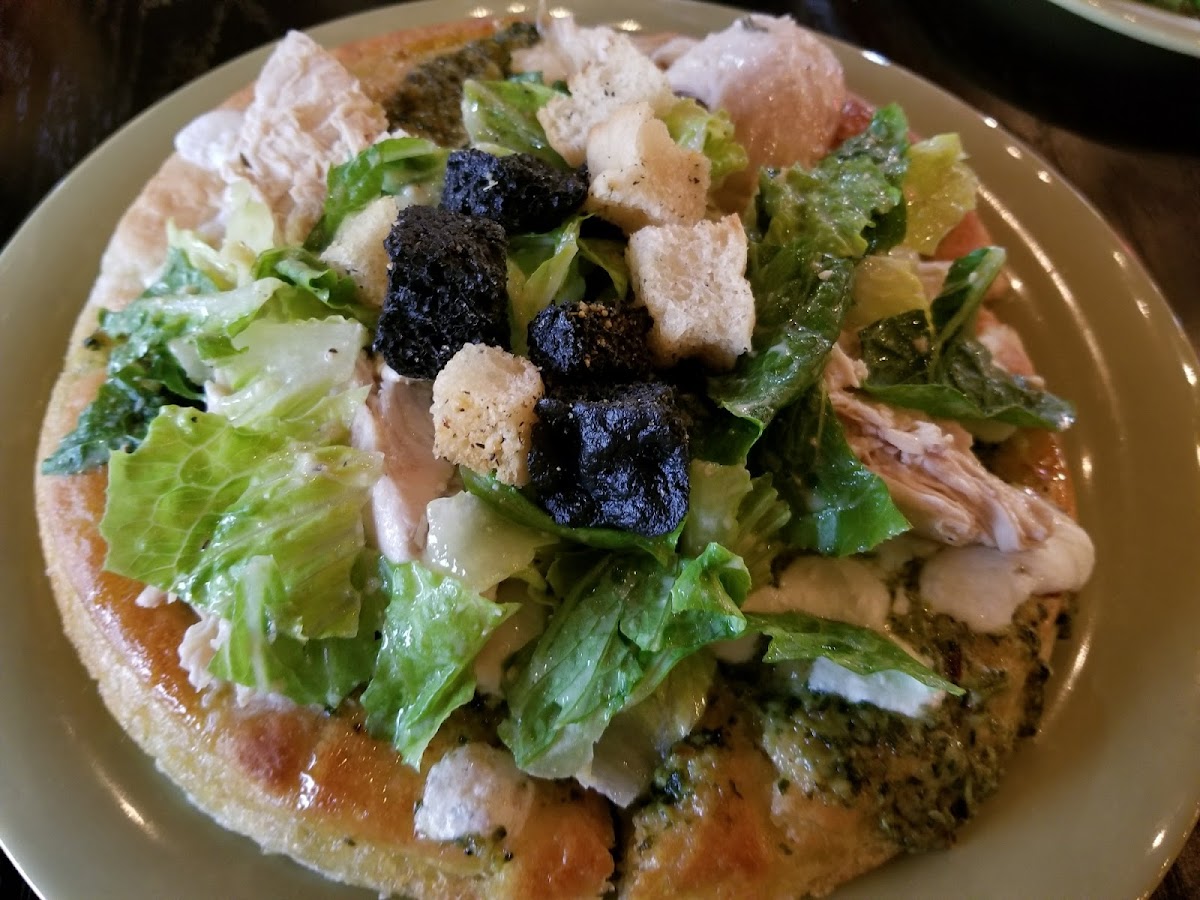 Chicken pizza-super tasty and topped with Caesar salad!!