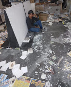 Picture-frame business owner Nagina Amarchand at her looted store in Springfield Park.