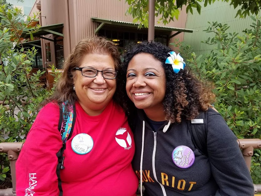 My mother Teresa and I at Disneyland.