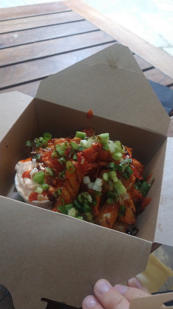 Halloumi fries with sundried tomatoes, spring onion and spiracha mayo