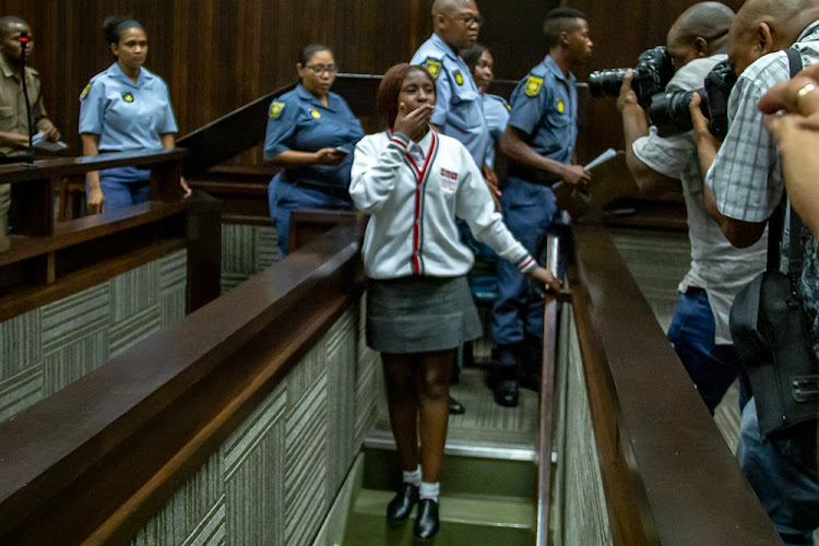 Karabo Tau blows a kiss to her family in the Bellville magistrate's court on Tuesday.