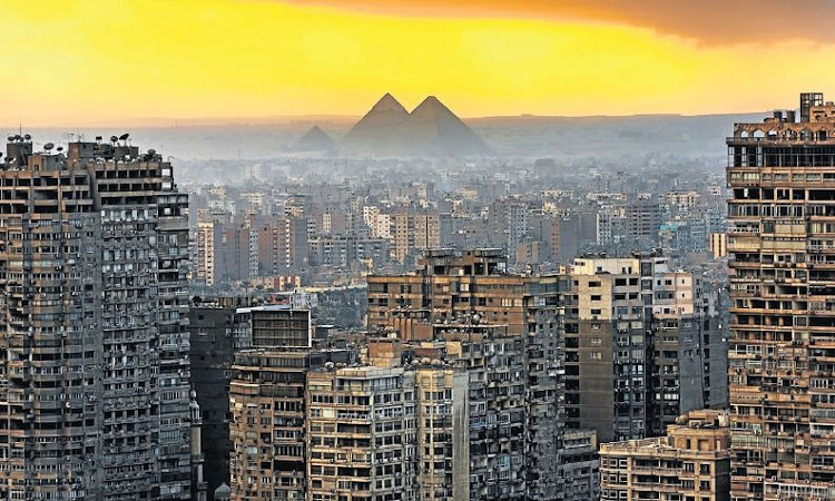 The urban sprawl of the conference host city, Cairo, Egypt, underlines the point about sustainable architecture.