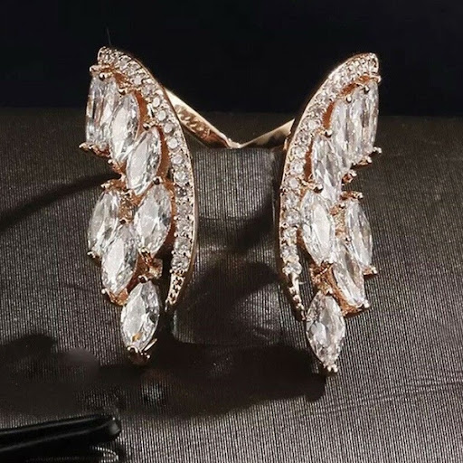 Title 14, Angel wing ring van legering