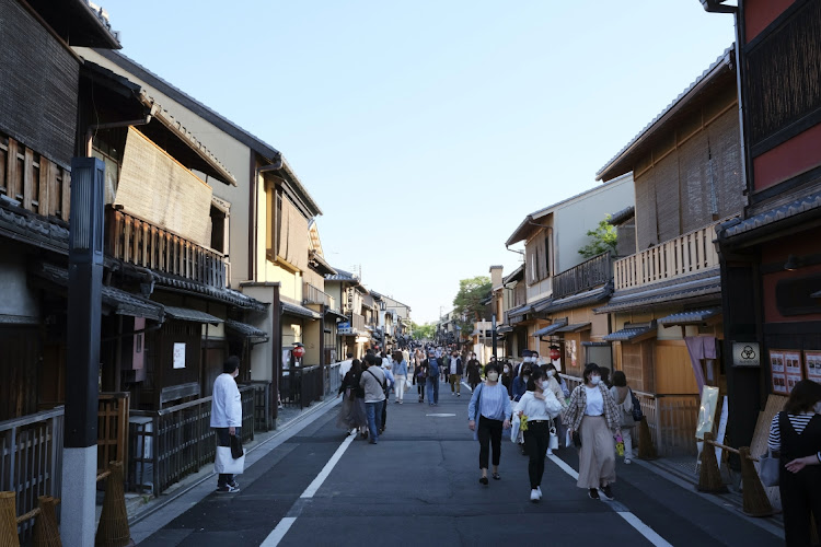 Pedestrians on Hanamikoji street during Golden Week holidays in Kyoto, Japan, on Tuesday, May, 3, 2022.