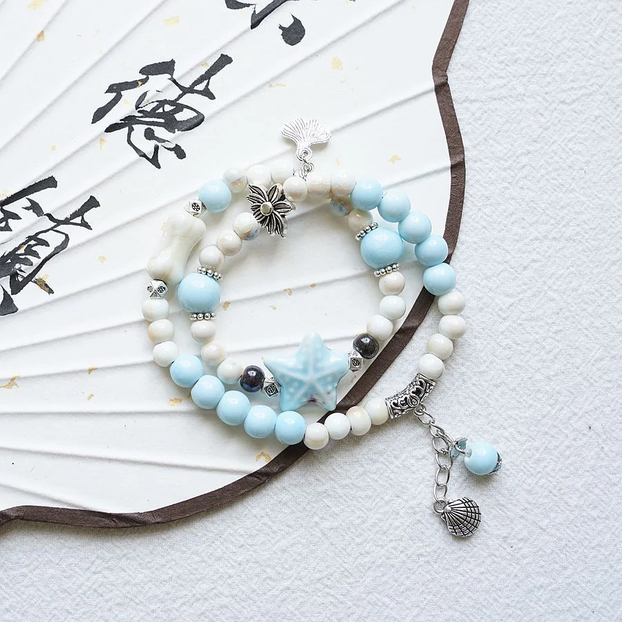 Bracelet en céramique style tibétain pour femme, cadeau d'anniversaire, design spirituel et élégant, un bijou unique pour elle.