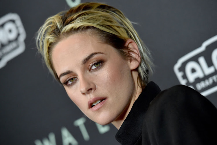 Kristen Stewart admits to being 'a glass-half-full optimist' who grew up thinking that she wouldn't choose to be a lesbian. File image.