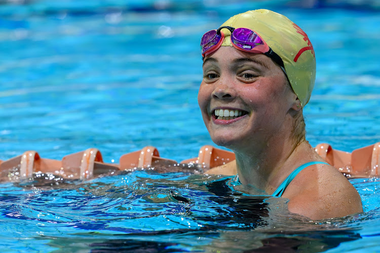 Erin Gallagher smiles after winning the women's 50m butterfly at the SA national championships in Gqeberha on Monday night.