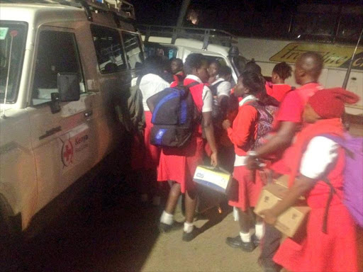 Students in Kisumu board a Kenya red Cross Society vehicle that transported them to schools in Siaya and Busia counties, January 4, 2018. /Courtesy