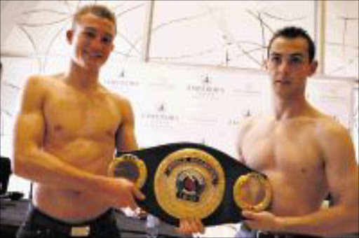 GLORY BOUND: Rising stars Jason 'The Batman' Bedeman, left, and Grant 'Fireball' Fourie during a press conference at Emperors Palace yesterday. Pic: Mohau Mofokeng. 11/08/2009. © Sowetan.