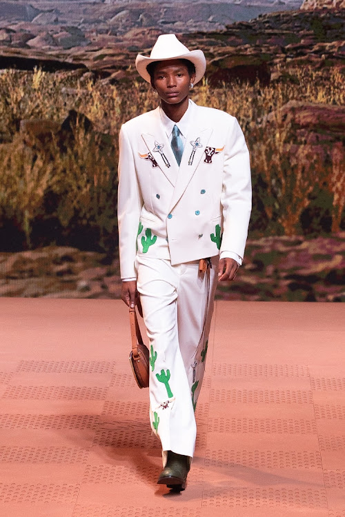 Lebo Malope rocks cowboy suiting on the runway during the Louis VuittonMenswear Fall/Winter 2024- 2025 show.