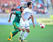 Amr Gamal of Bidvest Wits challenged by Punch Masenamela of Baroka during the Absa Premiership 2017/18 football match between Baroka and Bidvest Wits at Peter Mokaba Stadium, Polokwane on 22 October 2017.