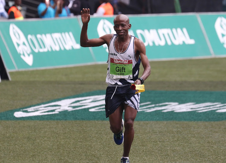 Gift Kelehe during the 2018 Comrades Marathon on June 10, 2018 in Durban, South Africa.