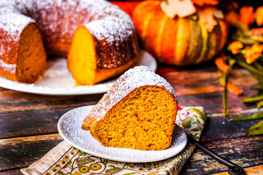 A slice of Pumpkin Bundt Cake on a plate.