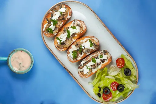 Sauteed Mushroom Goat Cheese And Herbs Ricotta On Toast