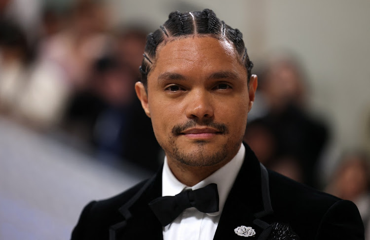 Trevor Noah poses at the Met Gala, an annual fundraising gala held for the benefit of the Metropolitan Museum of Art's Costume Institute with this year's theme "Karl Lagerfeld: A Line of Beauty", in New York City, New York, US, May 1, 2023.