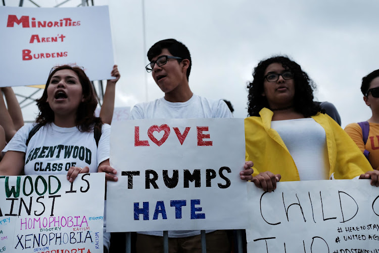 Protesters critical of the policies of President Donald Trump