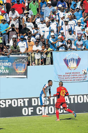 TOUGH HURDLE: Chippa defender Diamond Thopola takes a throw-in during their 2-0 win over Highlands Park at the Sisa Dukas he Stadium late last year. Chippa now face Downs test