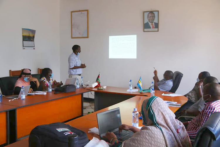 Lamu county NDMA ccordinator Mohamed Dahir makes a presentation during the meeting.