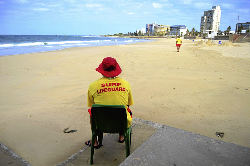 Lifeguards keep watch on Port Elizabeth beaches this week after President Cyril Ramaphosa announced that all beaches in the Eastern Cape would be closed. Access to the beaches was blocked by fences yesterday.