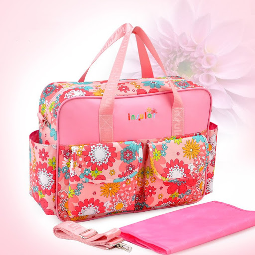 Title 8, Crossbody mommy bag for on-the-go parents. Spac...