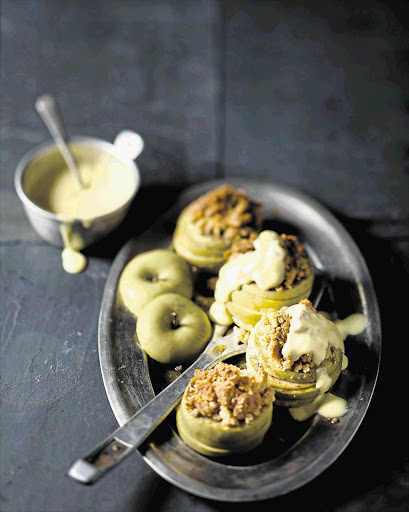 Baked apples with tennis biscuit crumbs and custard