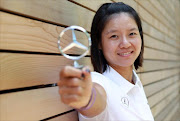 Tennis player Li Na of China, announced as global ambassador for Mercedes-Benz, poses for a photo before attending a press conference on June 19, 2011 in Wimbledon, England.  (Photo by Julian Finney/Getty Images)