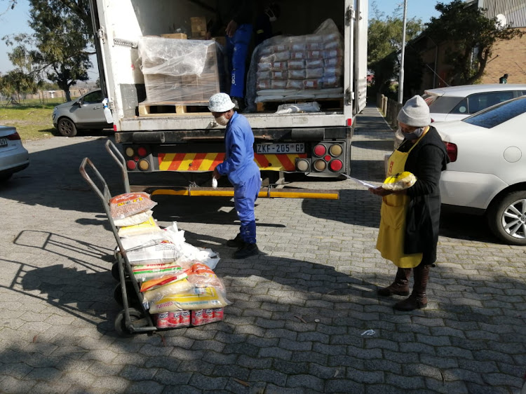 A delivery of staple foods for the feeding scheme at Kasselsvlei Comprehensive High School in Bellville South, Cape Town.