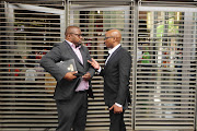 ANC spokesperson Zizi Kodwa and SASSA CEO Thokozani Magwaza outside the Constitutional Court. File photo.