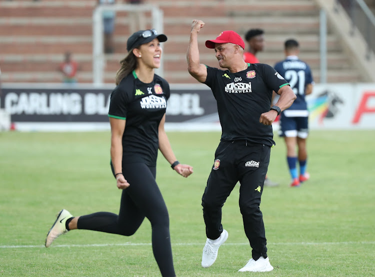 Highlands Park head coach Owen Da Gama (R) celebrates during an Absa Premiership match.