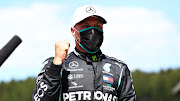  Pole position qualifier Valtteri Bottas of Finland and Mercedes GP celebrates in parc ferme during qualifying for the Formula One Grand Prix of Austria at Red Bull Ring on July 04, 2020 in Spielberg, Austria.