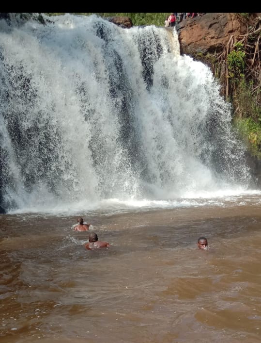 Murathi and his team of divers at Gachocho falls in Kigumo, Murang'a.