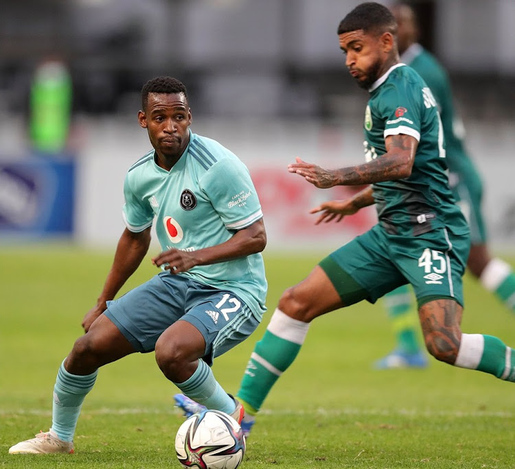 Orlando Pirates' Collins Makgaga and Keagan Buchanan of AmaZulu in the DStv Premiership match at Kings Park in Durban on December 8 2021.