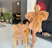 Tshego Manche, a member of 'The Mommy Club' cast, with her three children.