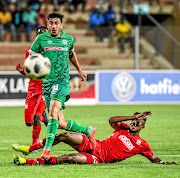 Emiliano Tade of AmaZulu tackled by Spiwe Msimango of Highlands Park. /Sydney Seshibedi/Gallo Images