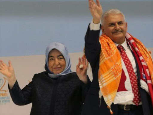 Binali Yildirim appeared at the party congress with his wife Semiha