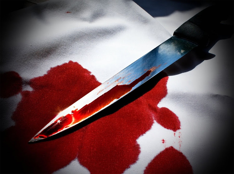 FILE PHOTO: Bloodied knife. (This photo is used for illustrative purposes)