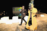 HAIL THE KINGS: Designer David Tlale taking a victory circuit with Kaizer Chiefs superfan Alfred Baloyi after winning the Nedbank Cup Fan Couture contest in Durban on Friday night