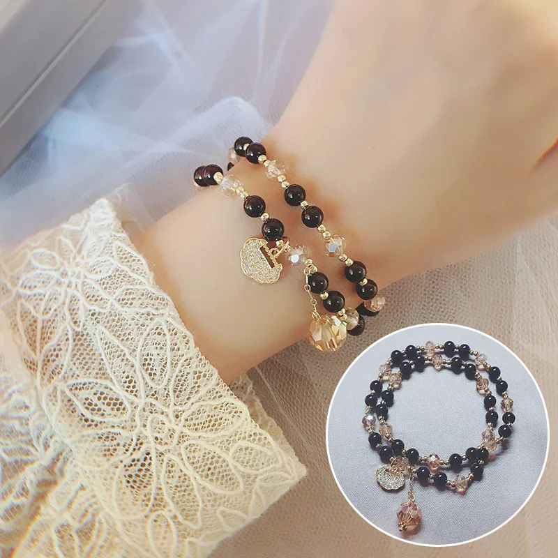 Bracelet Longevity Lock Quartz Fraise Grenat, favorisant la longévité et le bien-être. Équilibre énergétique pour une vitalité accrue.