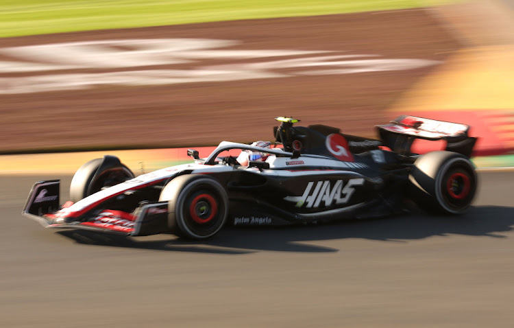 A spectator at the Formula One Australian Grand Prix suffered a cut to his arm when struck by a piece of debris from Kevin Magnussen's car.