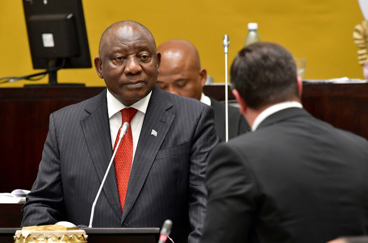 President Cyril Ramaphosa interacts with DA leader John Steenhuisen in his first question and answer session in parliament this year.