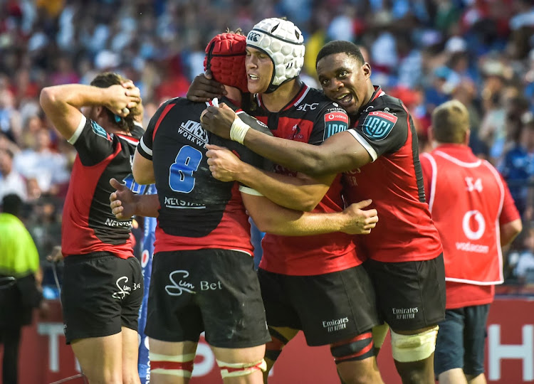 The Lions team celebrate as they win the match by 4 points during the United Rugby Championship match against the Bulls at Loftus Versfeld on March 04, 2023.