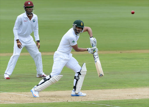 Alviro Petersen of South Africa drives during day 1 of the 1st Test match between South Africa and West Indies at SuperSport Park on December 17, 2014 in Pretoria, South Africa. File photo.