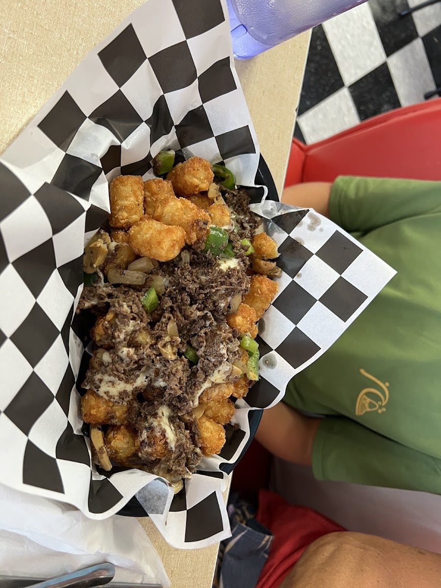 Philly cheese steak on top of GF tots