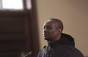 Elvis Ramosebudi, a man who allegedly plotted to assassinate officials perceived as state capture beneficiaries, at his first appearance in the Johannesburg Magistrate’s Court. File photo.