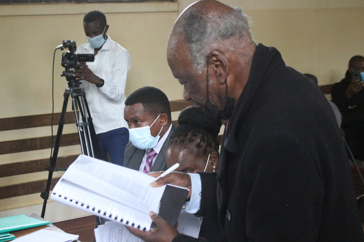 Lawyer John Khaminwa in court