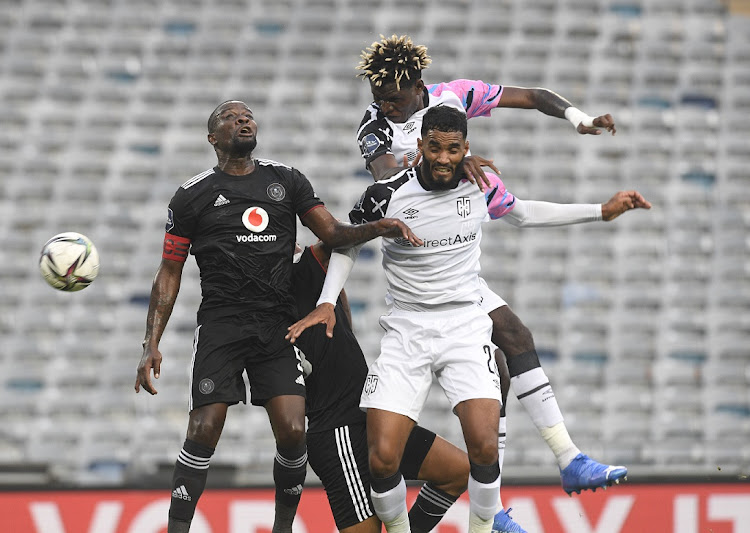 Nathan Fasika, right, of Cape Town City challenges Ntsikelelo Nyauza of Orlando Pirates during the DStv Premiership match at Orlando Stadium on Wednesday March 2 2022.