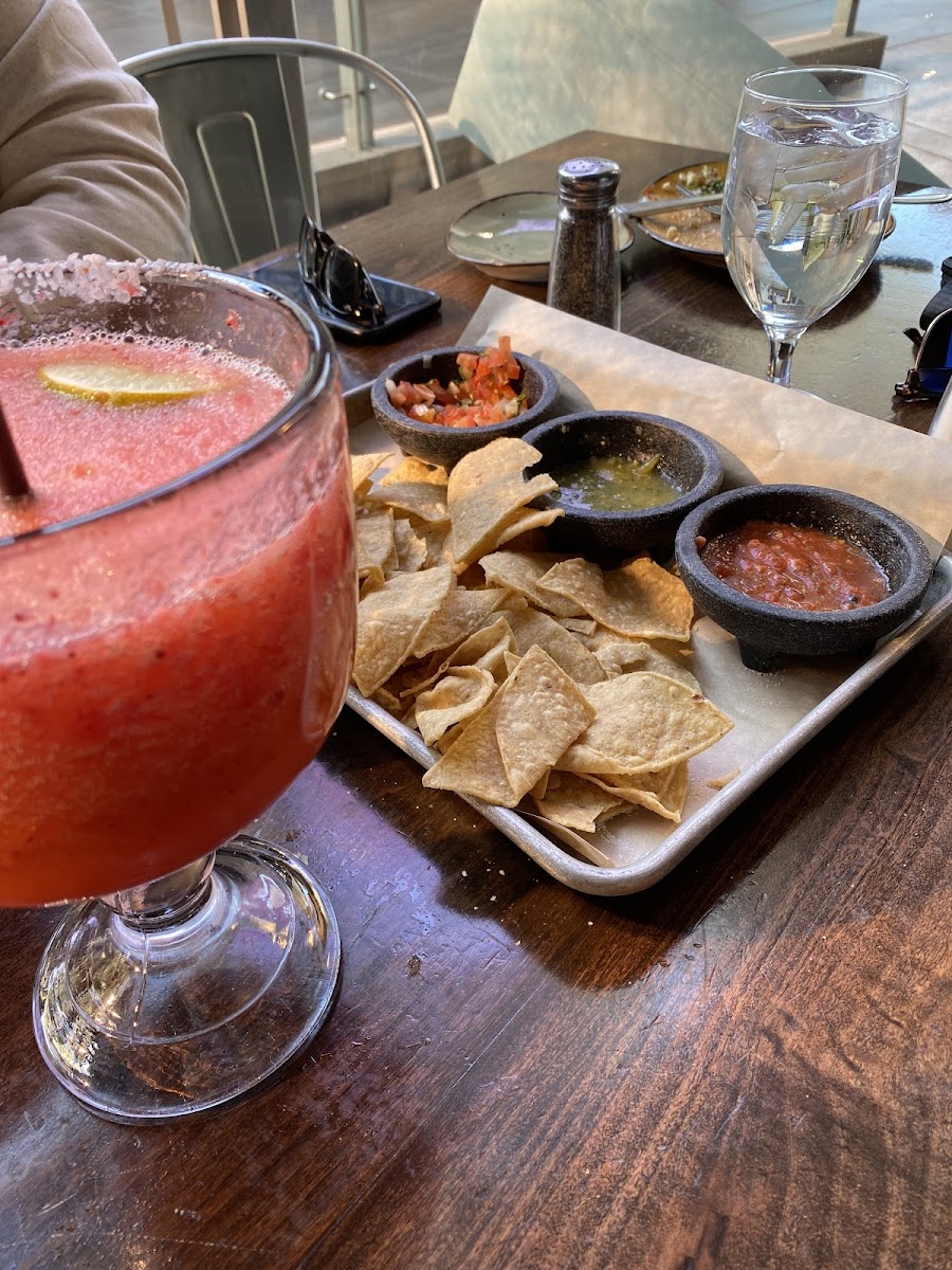 Chips & salsa & the best strawberry marg I’ve ever had! Salsa has good flavor, not spicy.