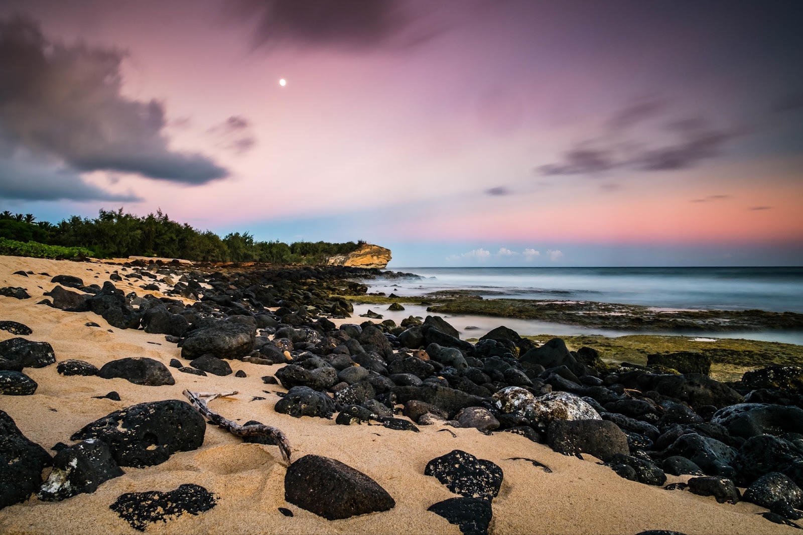 Molten lava rocks meet the ocean in a mesmerizing display.